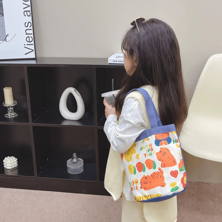 Children's cute cartoon canvas bag featuring vibrant colors and playful designs, perfect for carrying toys and snacks.