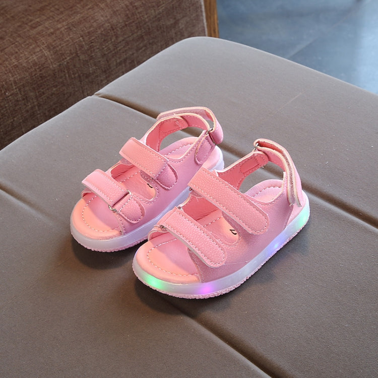 Children's pink LED light up beach shoes with soft sole and breathable design, perfect for summer activities.