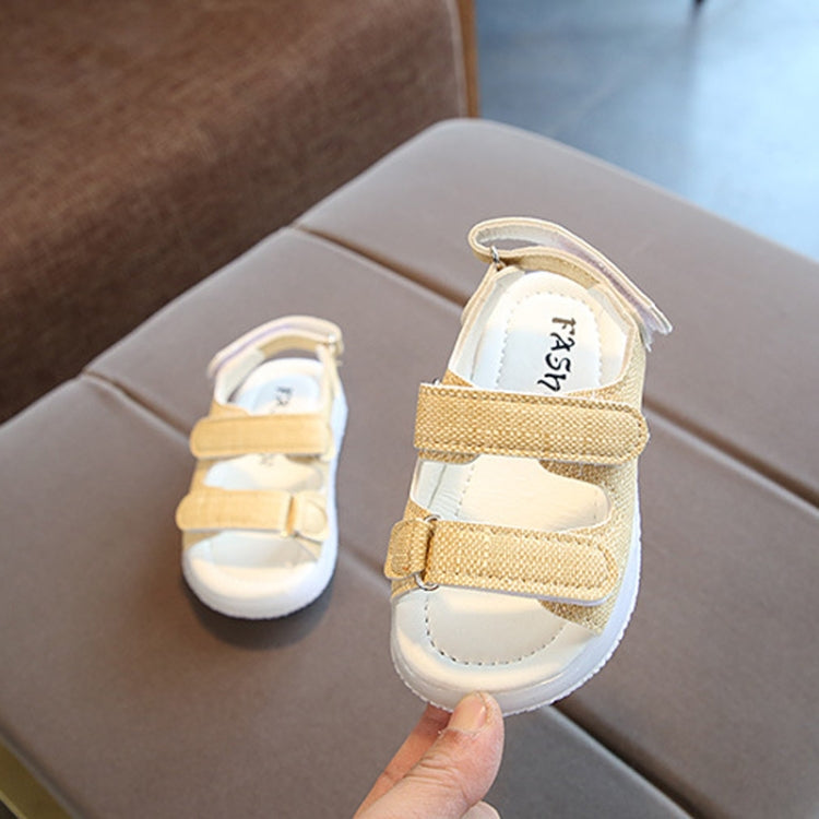 Children's LED light-up beach shoes with soft soles, featuring breathable artificial leather and nylon straps, perfect for summer fun.