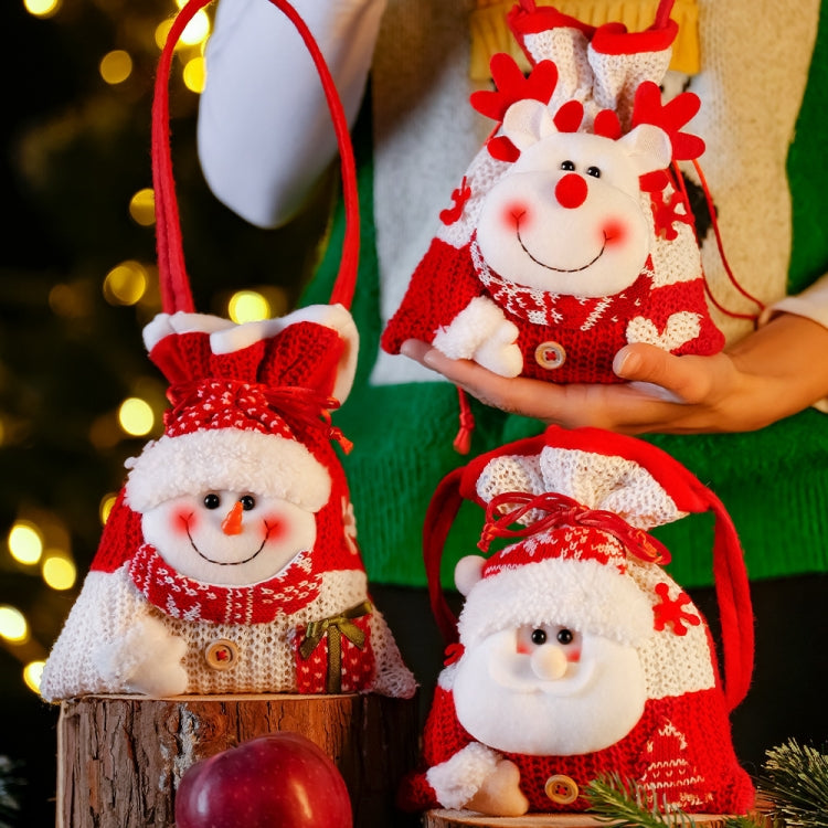 Christmas knitted handheld gift bag for children featuring a cute cartoon design, made from soft flannel and linen, perfect for candies and small gifts.