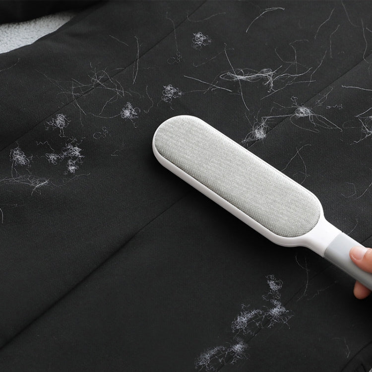 Clothes Sofa Dust Remover featuring a double-sided electrostatic design, made from durable ABS and polyester yarn, ideal for removing dust and hair.