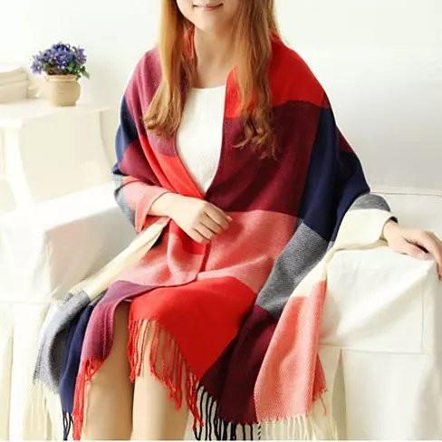 COLORAMA Reversible Shawl featuring vibrant colors and unique square patterns, with delicate fringes at the hemline, perfect for cozy styling.