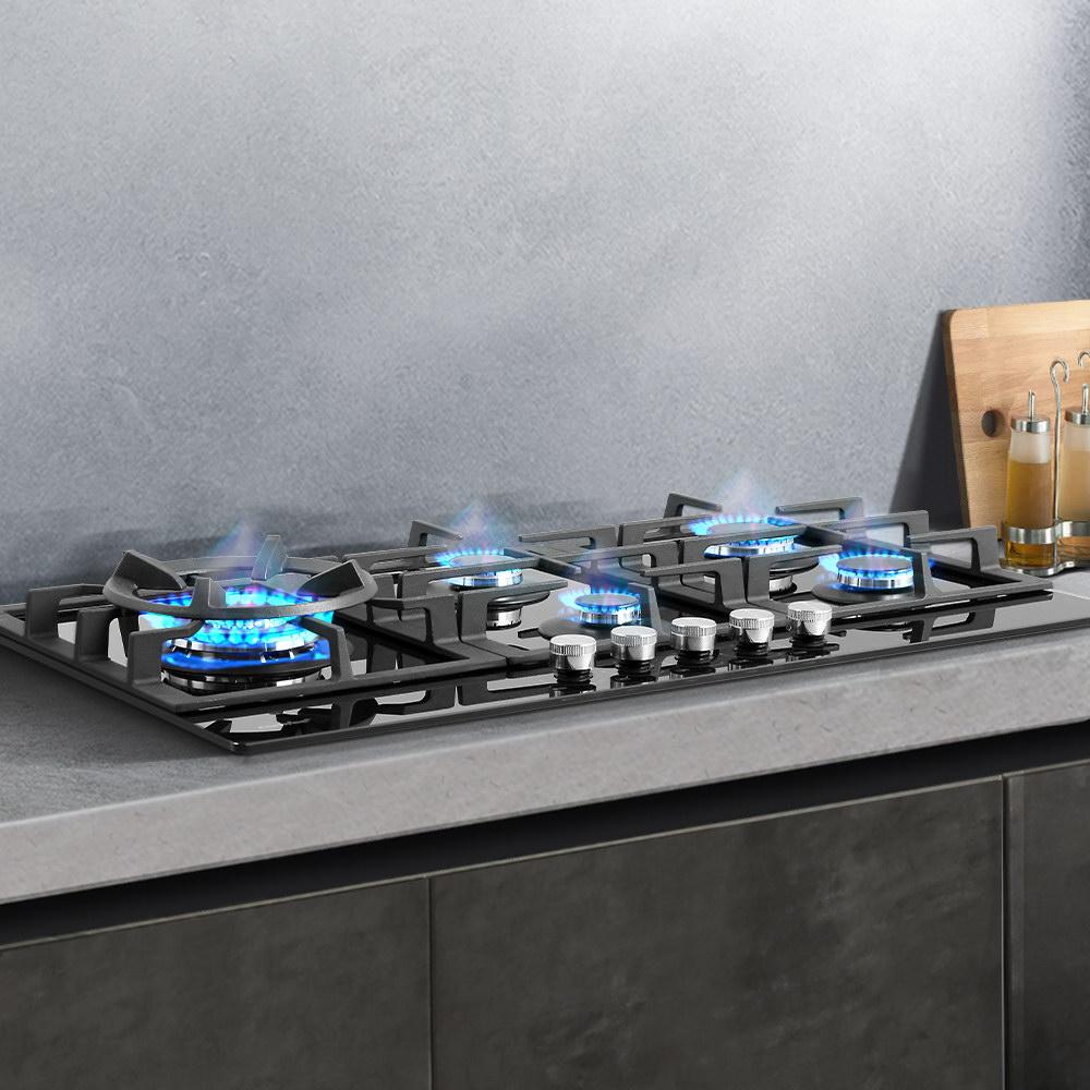 Comfee Gas Cooktop featuring 5 burners on a sleek black tempered glass surface with solid cast iron grates.