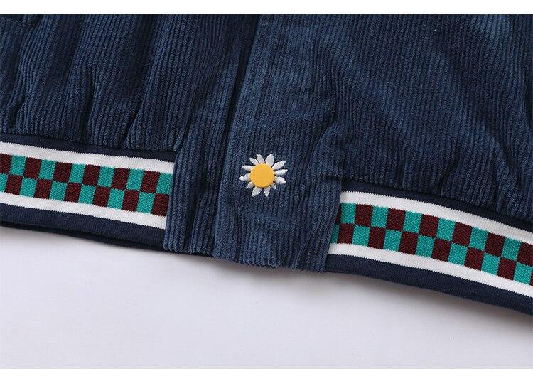 Men's corduroy jacket featuring daisy flowers and letter embroidery, showcasing a loose fit and retro style.