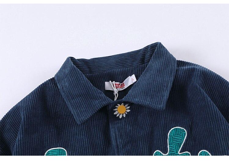 Men's corduroy jacket featuring daisy flowers and letter embroidery, showcasing a loose fit and retro style.