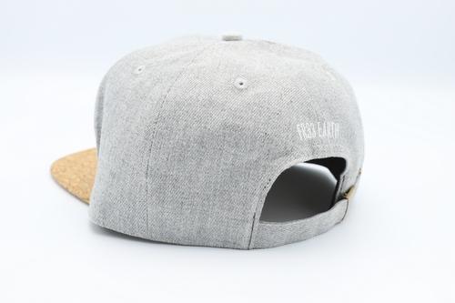 Stylish grey cork cap with rustic buckle, perfect for sun protection.