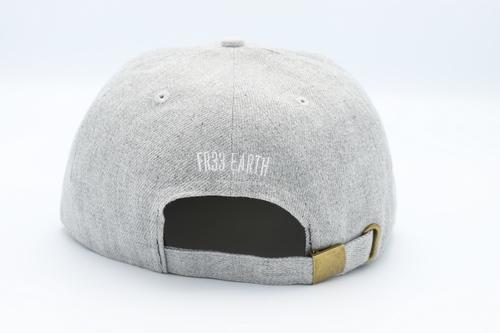 Stylish grey cork cap with rustic buckle, perfect for sun protection.