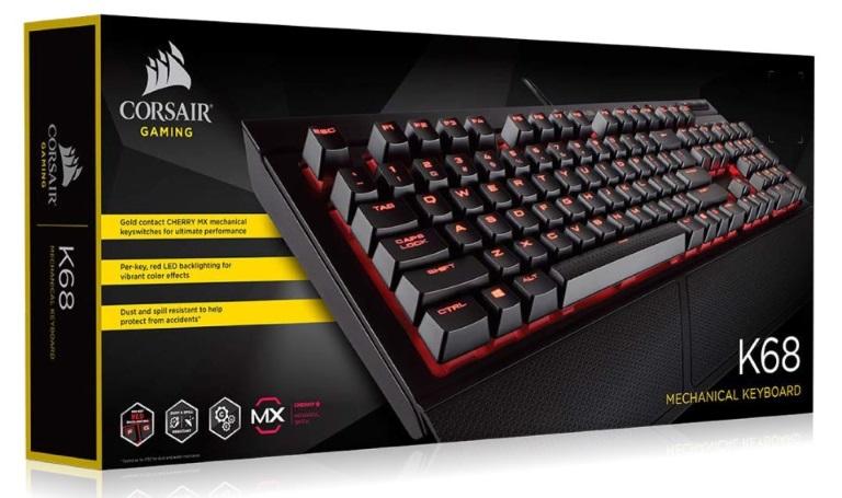 CORSAIR Gaming K68 mechanical keyboard with dynamic RGB backlighting and dedicated multimedia controls, showcasing its spill-resistant design.