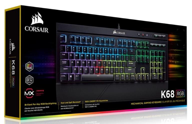 CORSAIR K68 RGB Mechanical Gaming Keyboard with vibrant RGB lighting and Cherry MX switches, showcasing its durable design and multimedia controls.