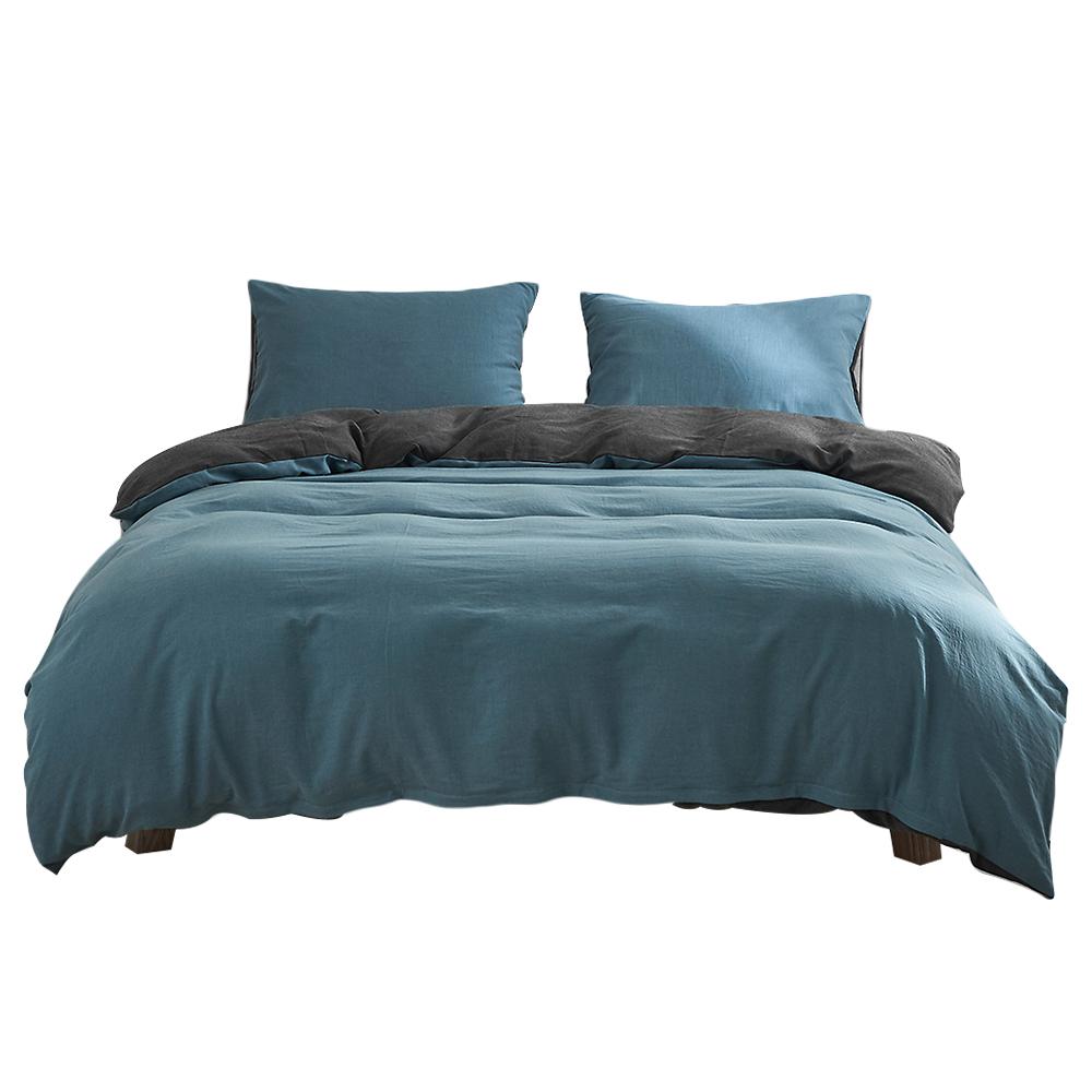 Cosy Club Quilt Cover Set in Deep Ocean color, showcasing a soft and breathable 100% washed cotton fabric with a two-tone design.