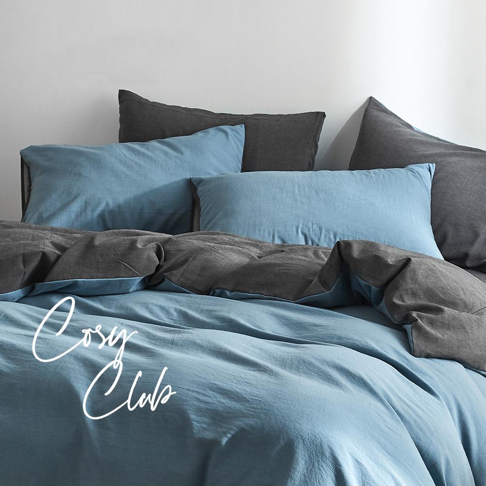 Cosy Club Quilt Cover Set in Deep Ocean color, showcasing a soft and breathable 100% washed cotton fabric with a two-tone design.