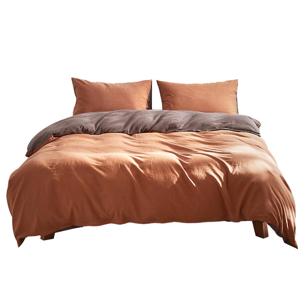 Cosy Club Quilt Cover Set in earthy pumpkin color, showcasing soft washed cotton fabric and stylish two-tone design.