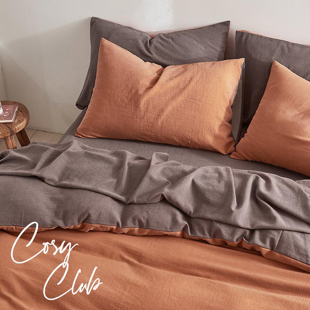 Cosy Club Quilt Cover Set in earthy pumpkin color, showcasing soft washed cotton fabric and stylish two-tone design.