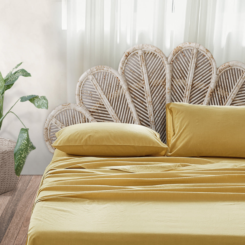 Cosy Club Sheet Set in yellow, featuring a flat sheet, fitted sheet, and pillow cases made from soft washed cotton.