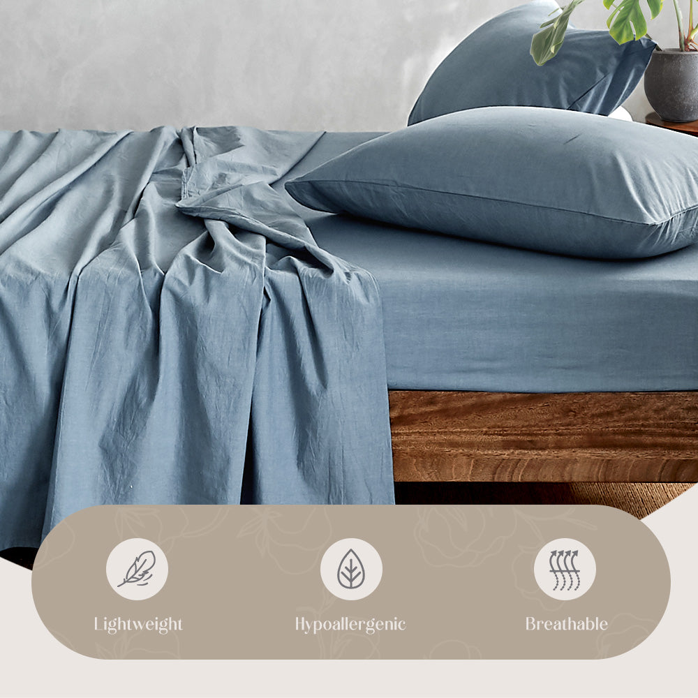 Cosy Club Sheet Set in blue, featuring a flat sheet, fitted sheet, and pillowcase made from 100% washed cotton, showcasing a soft and breathable texture.