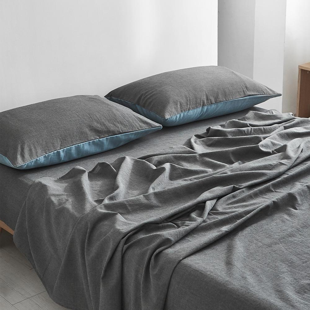 Cosy Club Dark Blue Cotton Sheet Set featuring a fitted sheet, flat sheet, and pillowcase, showcasing a soft texture and two-tone design.