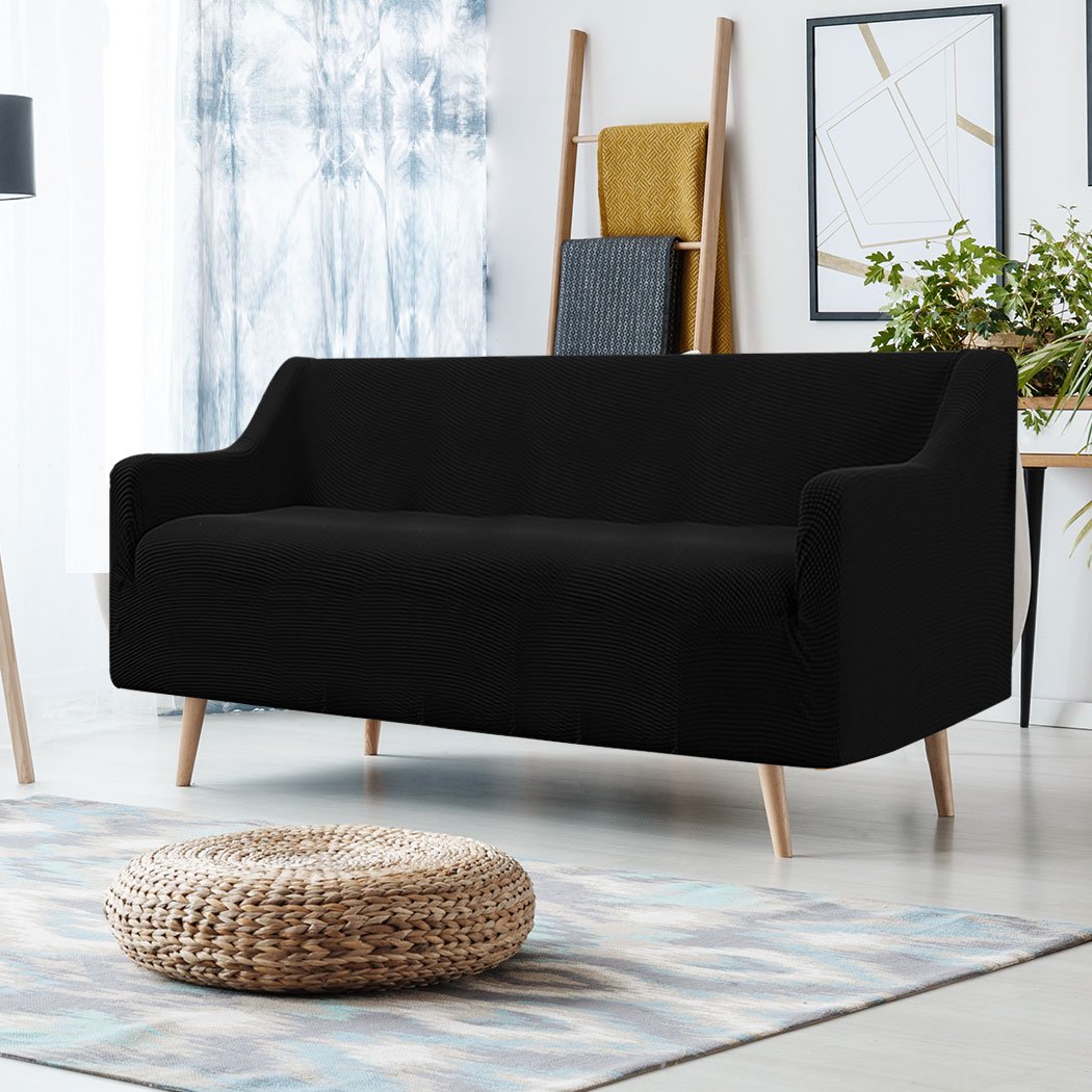 Black Couch Stretch Sofa Lounge Cover Protector Slipcover designed for 3-seater sofas, showcasing its high stretch material and well-stitched edges.