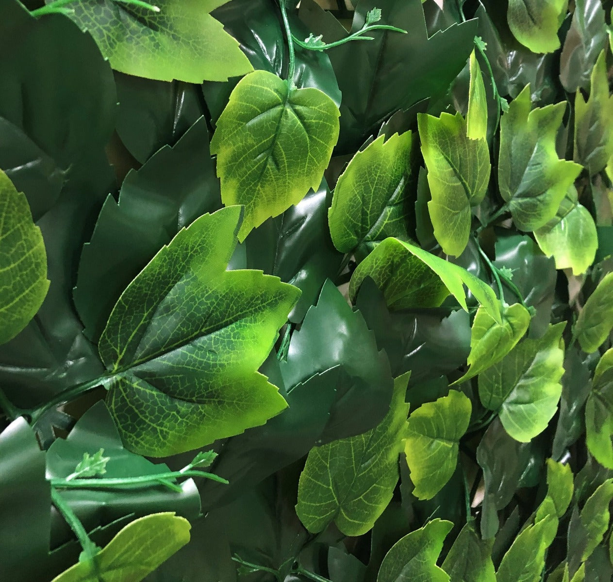 Country Oak Artificial Vertical Garden Hedge Panel 1m x 1m with realistic foliage and plastic mesh backing, ideal for indoor and outdoor use.