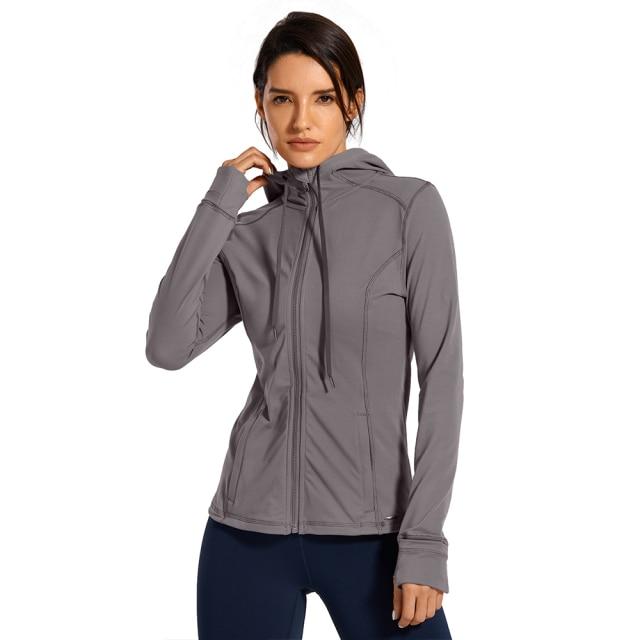 CRZ YOGA Women's Hooded Workout Track Running Jacket in stylish design, showcasing full zip and hooded features.