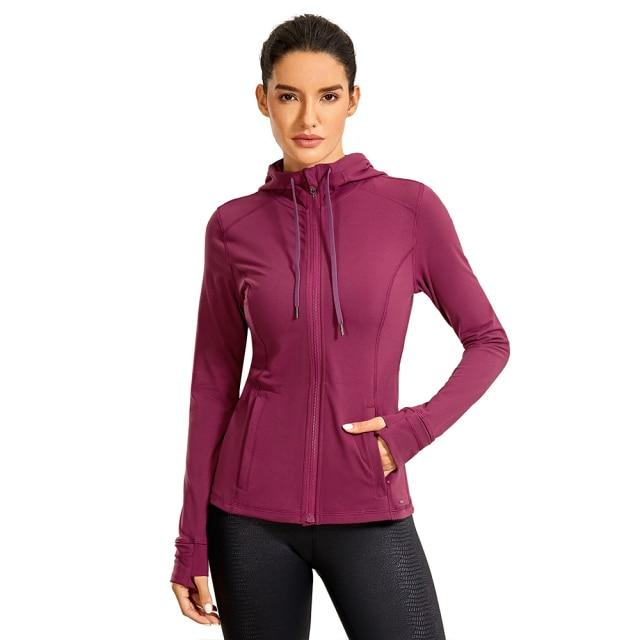 CRZ YOGA Women's Hooded Workout Track Running Jacket in stylish design, showcasing full zip and hooded features.