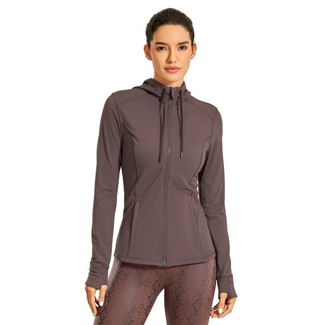 CRZ YOGA Women's Hooded Workout Track Running Jacket in stylish design, showcasing full zip and hooded features.