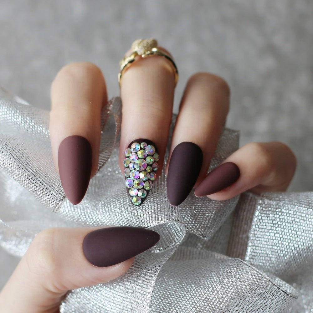 Dark coffee full stiletto press-on nails displayed in a stylish arrangement, showcasing their elegant design and color.