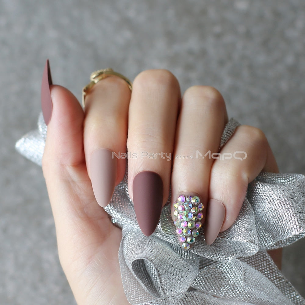 Dark coffee full stiletto press-on nails displayed in a stylish arrangement, showcasing their elegant design and color.