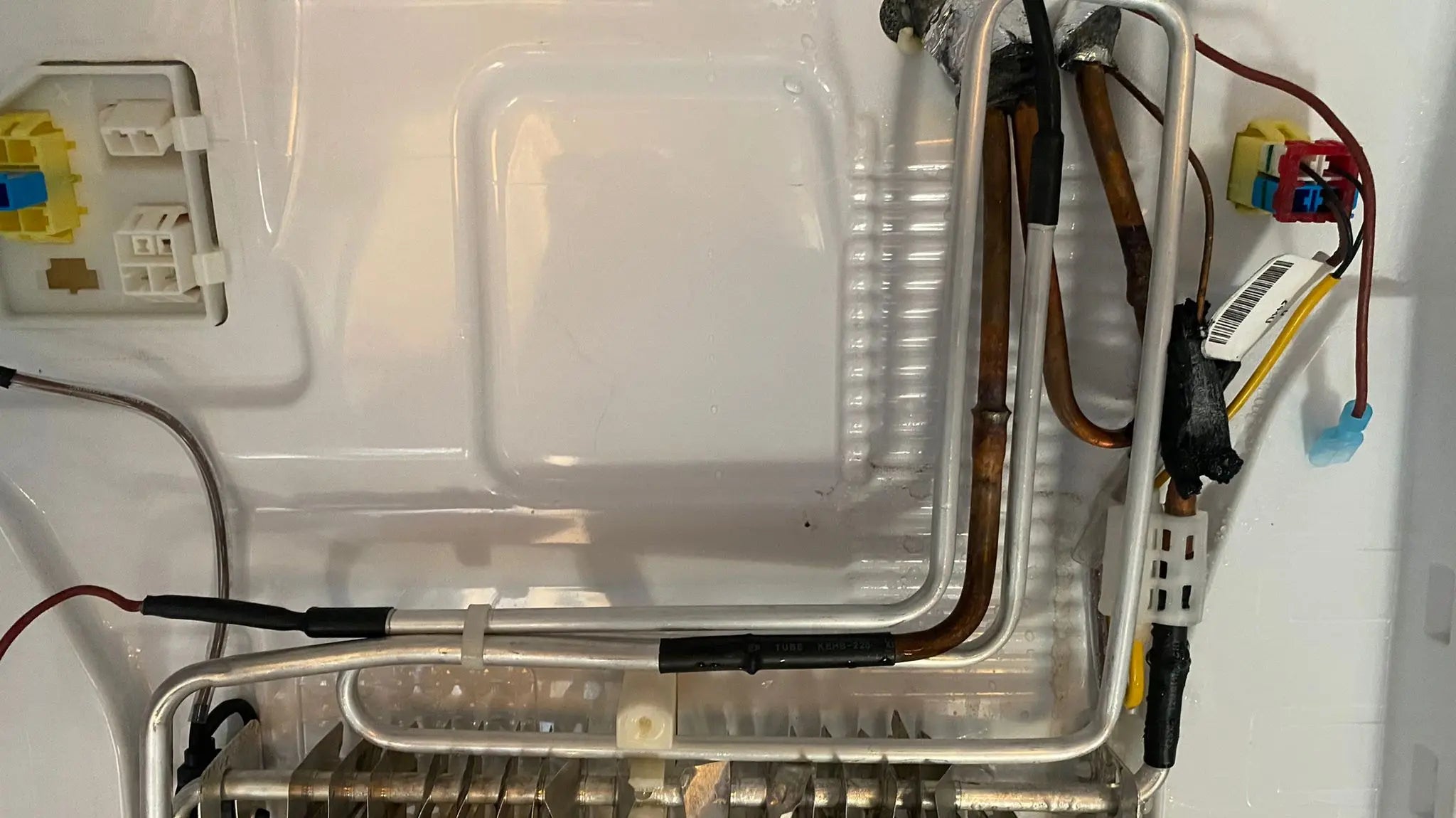 Defrost Booster Kit for Samsung Refrigerator, including heating coil and connectors, designed to eliminate ice buildup.