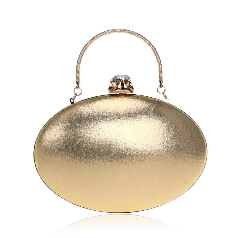 Elegant egg-shaped clutch for women adorned with rhinestones and a chain shoulder strap, perfect for evening events.