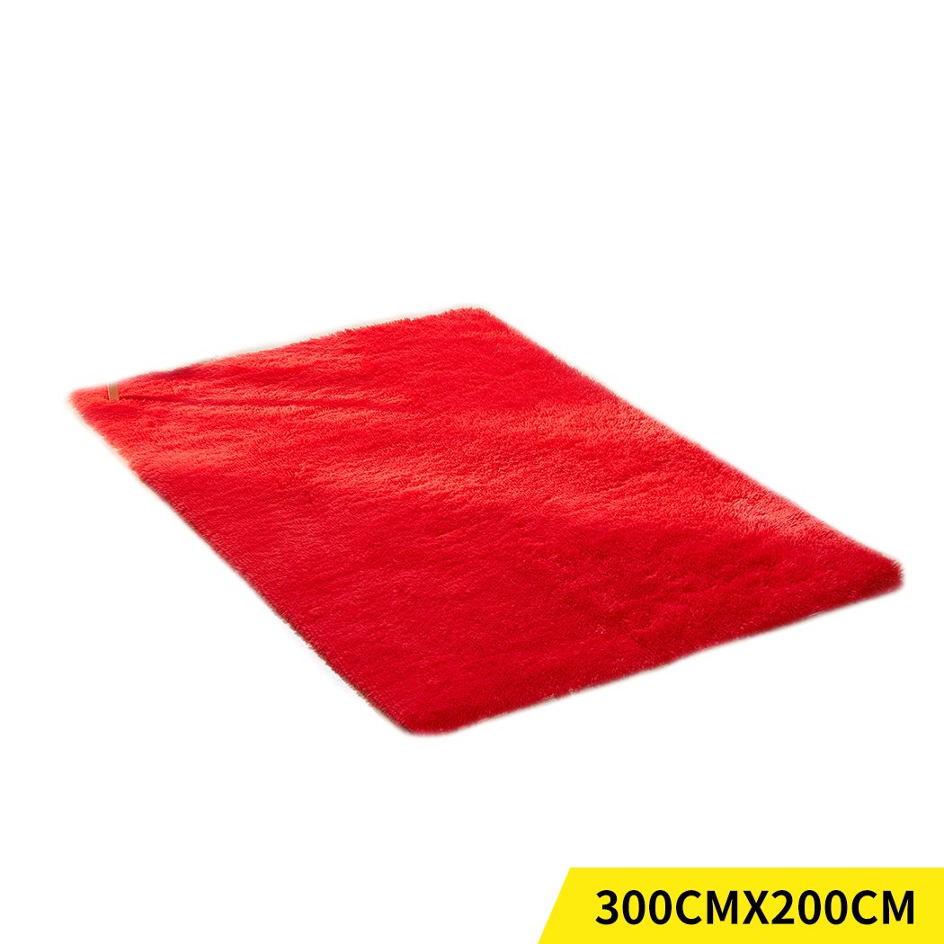 Designer Soft Shag Shaggy Floor Confetti Rug in vibrant red color, showcasing its plush texture and non-slip silicone bottom.