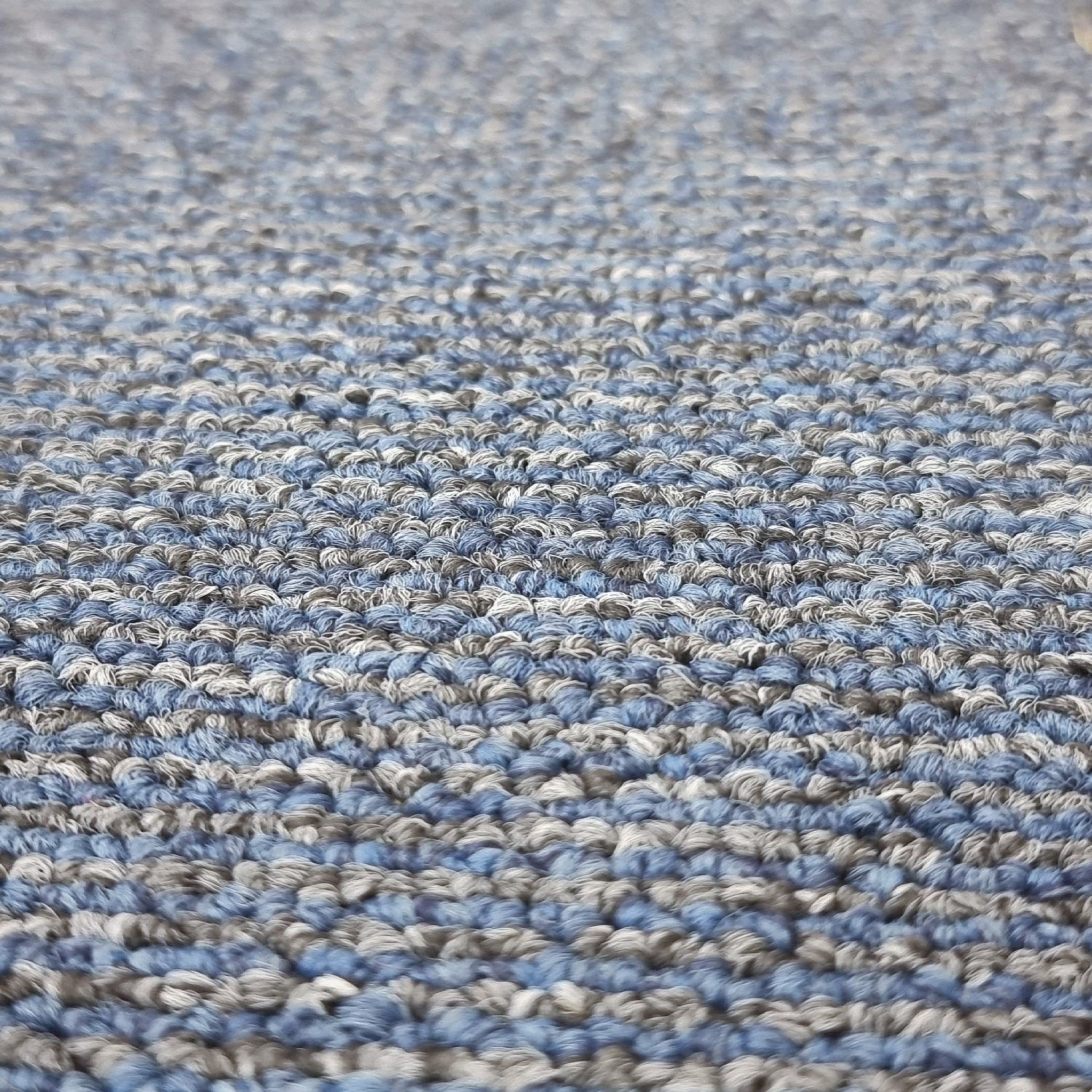 Desso Grey Blue Stripe carpet tiles featuring a playful stripe design in grey and blue tones, ideal for commercial and residential use.