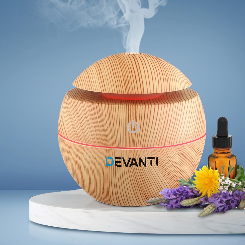 Devanti Aromatherapy Diffuser with wood grain design, showcasing LED lights and mist function.