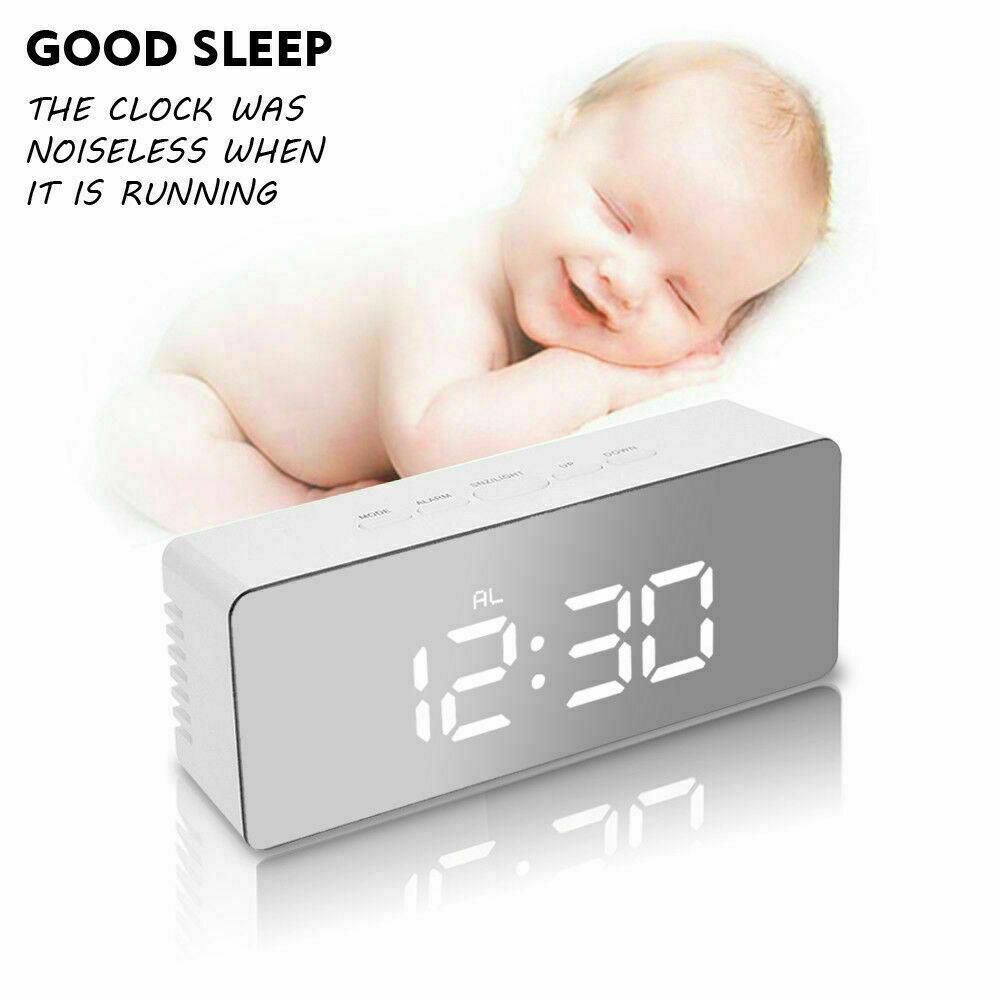 Digital LED Mirror Alarm Clock displaying time and temperature with a sleek mirror finish.