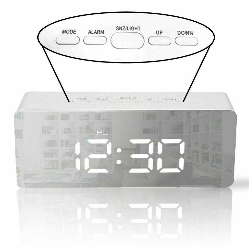 Digital LED Mirror Alarm Clock displaying time and temperature with a sleek mirror finish.