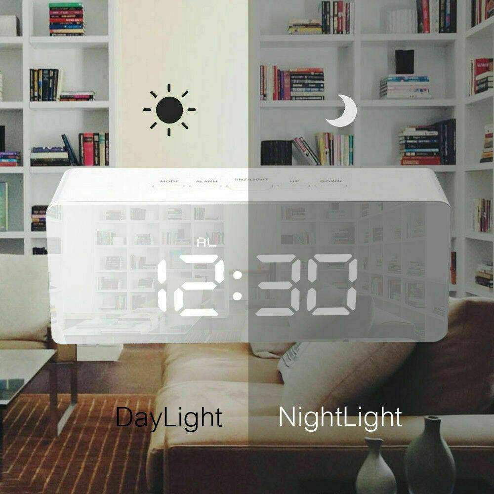 Digital LED Mirror Alarm Clock displaying time and temperature with a sleek mirror finish.