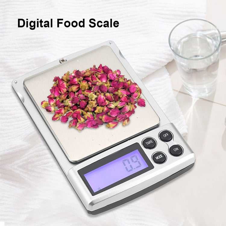 Digital Pocket Scale in black color with stainless steel tray, displaying weight measurements.