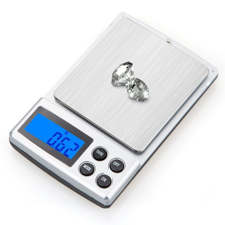 Digital Pocket Scale in black color with stainless steel tray, displaying weight on LCD screen.