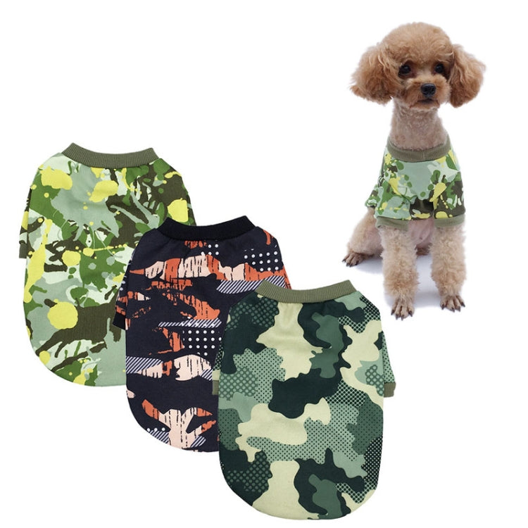 A small dog wearing a camouflage fleece sweater, showcasing its stylish design and warm fabric, perfect for autumn and winter.