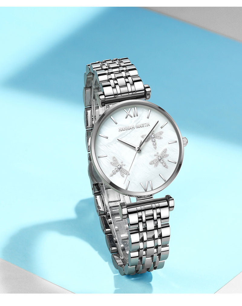 Dragonfly Design White Oyster Scallop Dial Japan Quartz Ladies Watch with stainless steel band and elegant scallop dial.