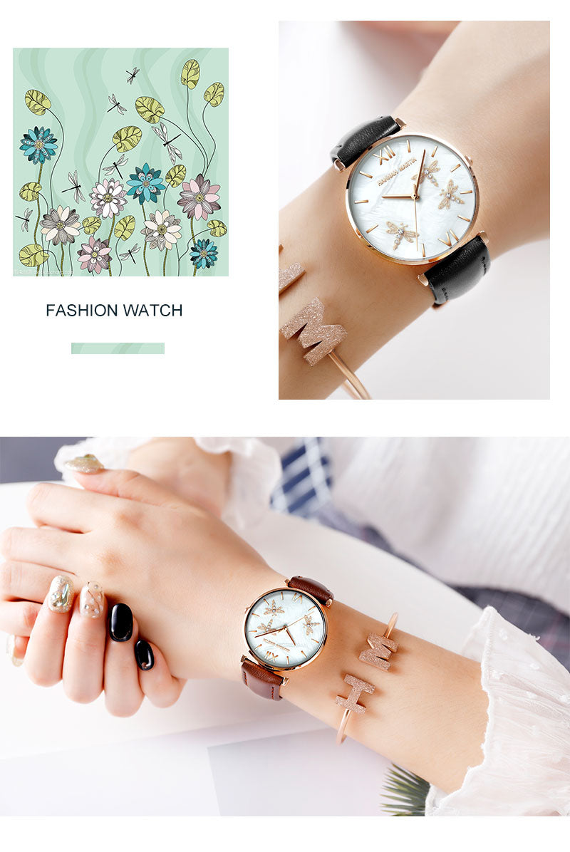 Dragonfly Design White Oyster Scallop Dial Japan Quartz Ladies Watch with stainless steel band and elegant scallop dial.