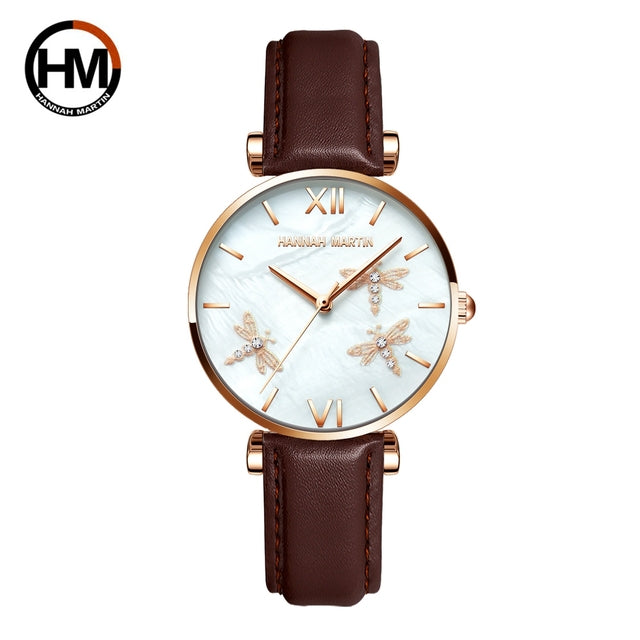 Dragonfly Design White Oyster Scallop Dial Japan Quartz Ladies Watch with stainless steel band and elegant scallop dial.