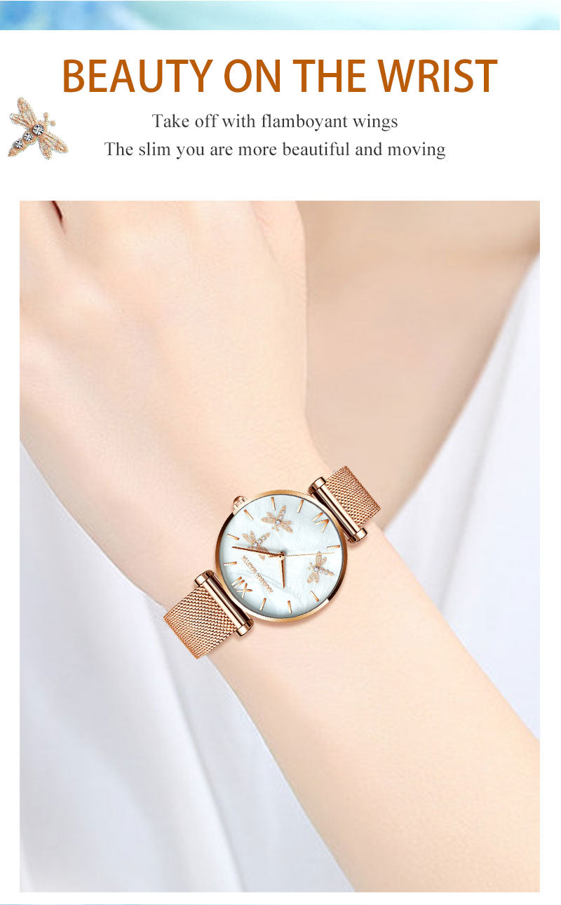 Dragonfly Design White Oyster Scallop Dial Japan Quartz Ladies Watch with stainless steel band and elegant scallop dial.