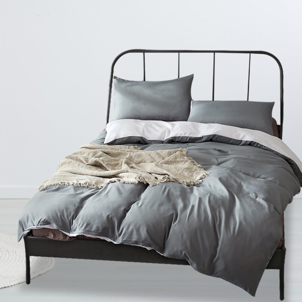 DreamZ 1000TC Microfibre Reversible Duvet Cover and Pillow Case Set in white and grey, showcasing its elegant design and soft texture.