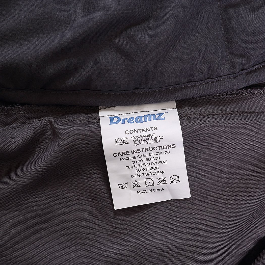 DreamZ 7KG Weighted Blanket in dark grey with bamboo cover, designed for deep sleep and anxiety relief.