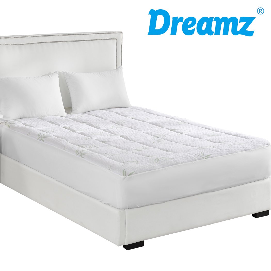 Dreamz Bamboo Pillowtop Mattress Topper Protector in white, showcasing its plush and fluffy texture, designed for comfort and cooling.