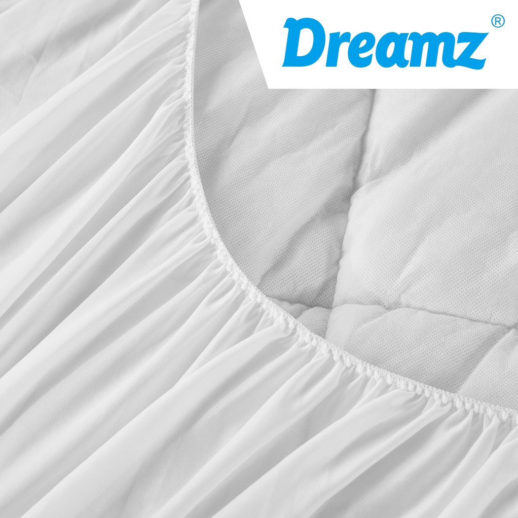 Dreamz Bamboo Pillowtop Mattress Topper Protector in white, showcasing its plush and fluffy texture, designed for comfort and cooling.