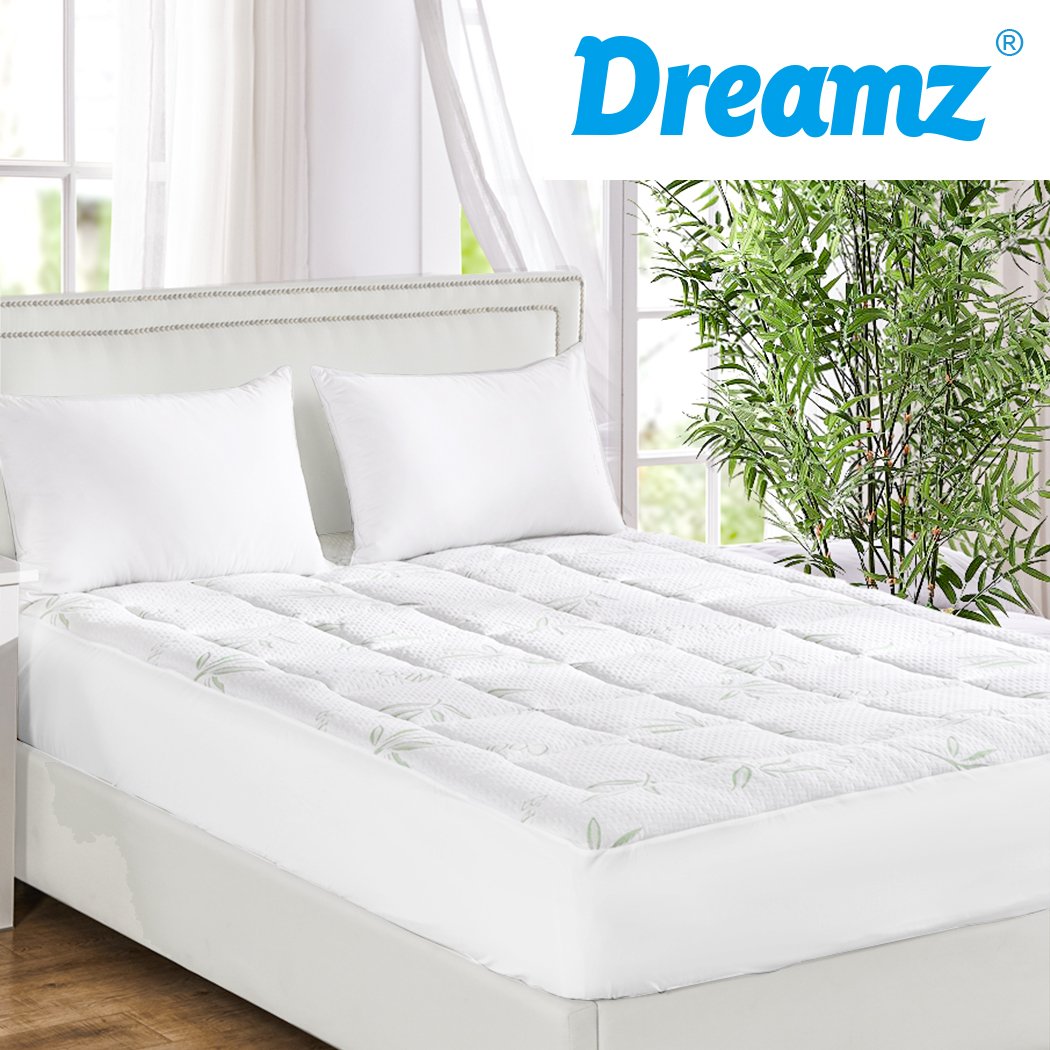 Dreamz Bamboo Pillowtop Mattress Topper Protector in white, showcasing its plush and fluffy texture, designed for comfort and cooling.