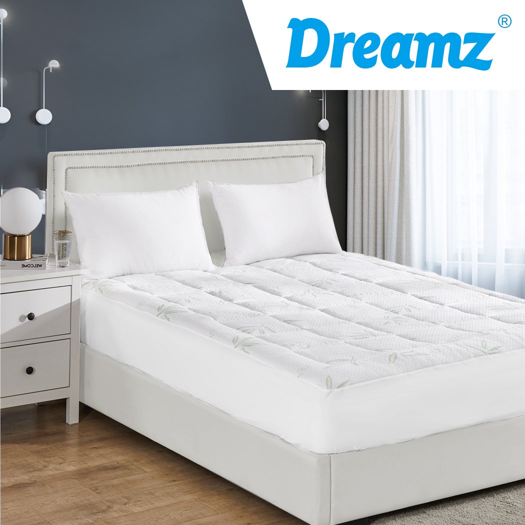 Dreamz Bamboo Pillowtop Mattress Topper Protector in white, showcasing its plush and fluffy texture, designed for comfort and cooling.