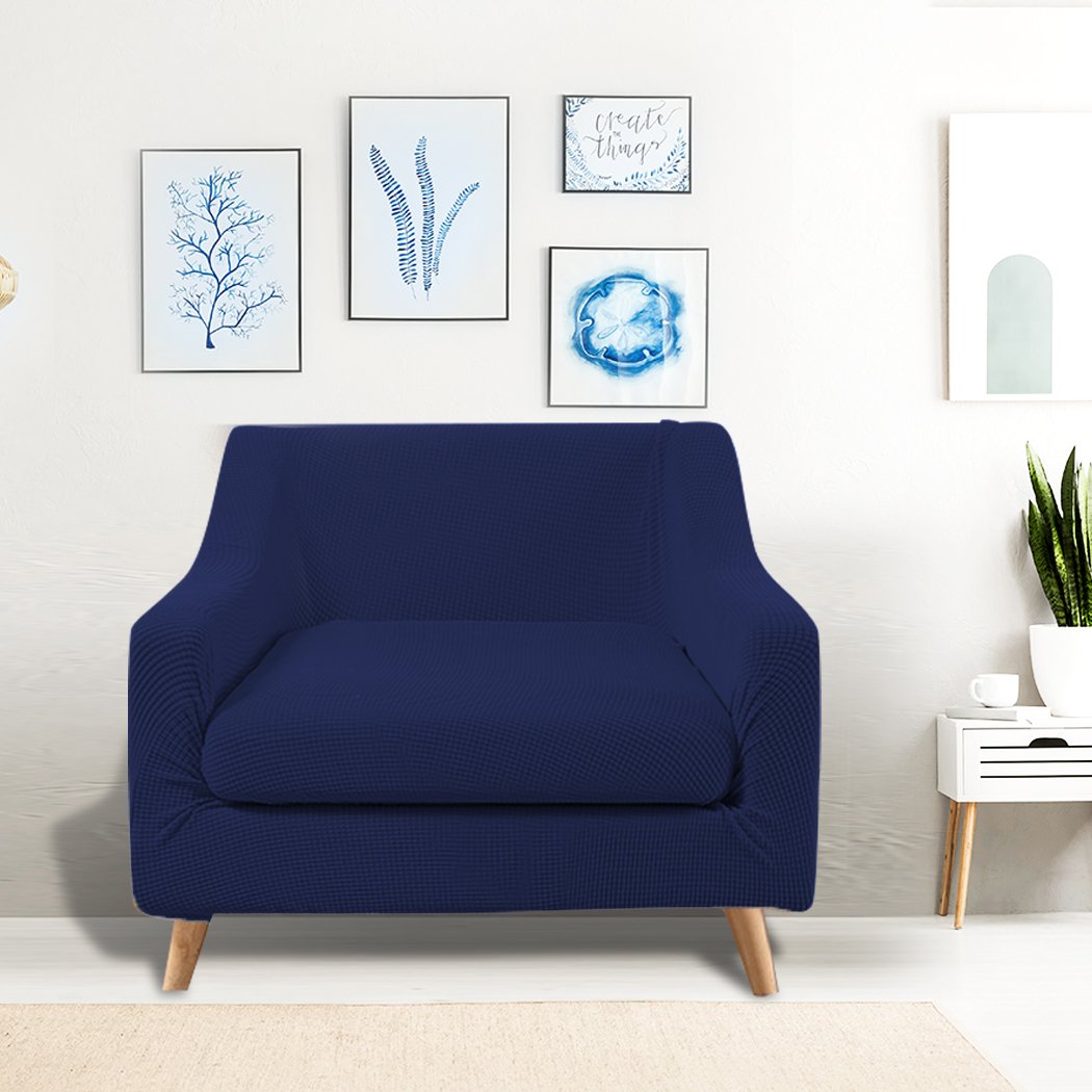 DreamZ Couch Sofa Seat Cover in navy color, showcasing its stretchable fabric and well-stitched edges, designed for 1-seater sofas.