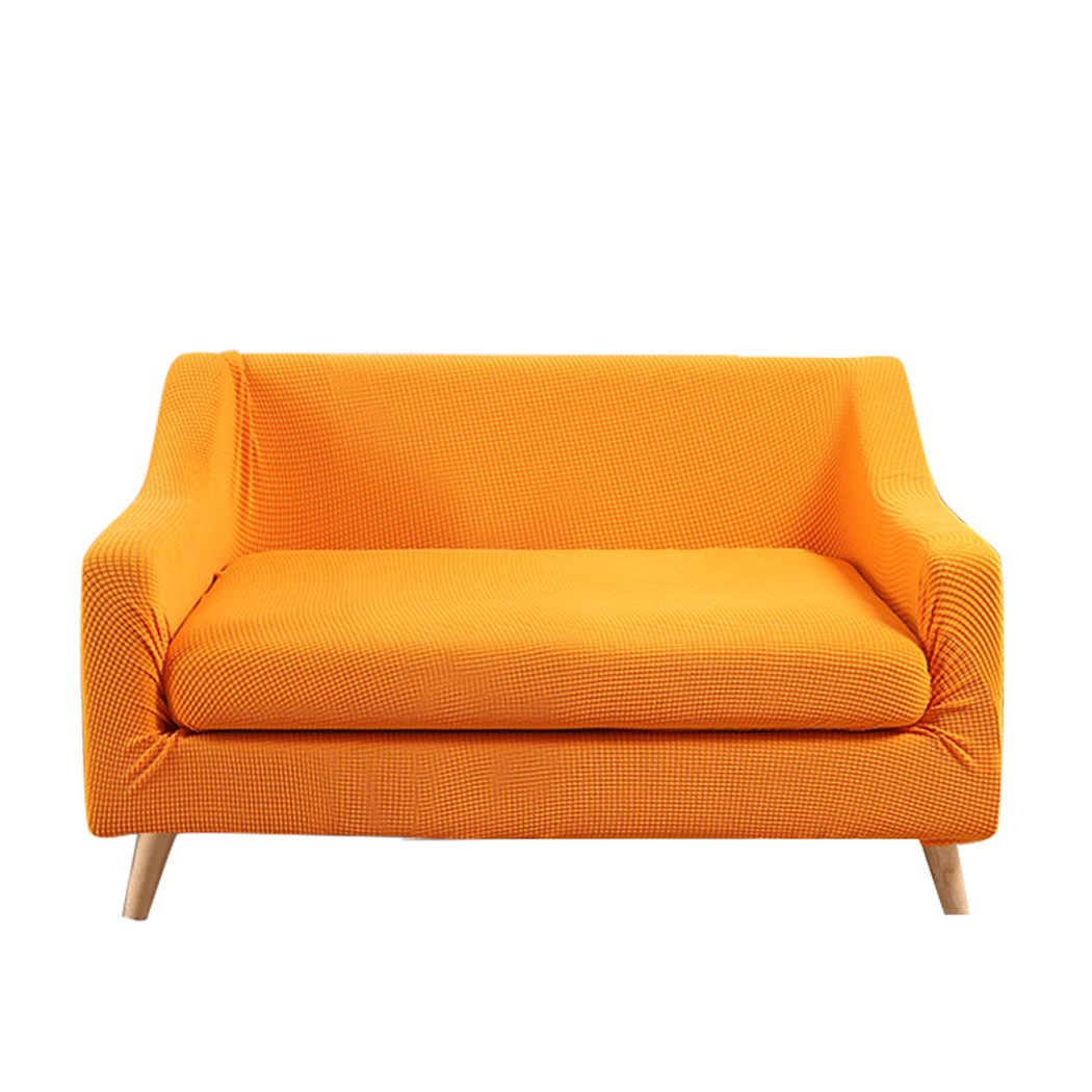 DreamZ Couch Sofa Seat Covers in vibrant orange, designed for 2-seater sofas, showcasing stretchable fabric and well-stitched edges.